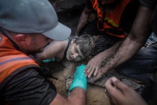 Palestinians try to rescue a boy from under the rubble of a destroyed building following an Israeli airstrike in Khan Younis refugee camp, southern Gaza Strip, Monday, Nov. 6, 2023.
by Mohammed...