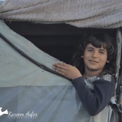 |Children of Gaza laugh despite the displacement and difficult life they face in tents and moving from their living area to other areas that resemble the desert.

اطفال غزة يضحكون...
