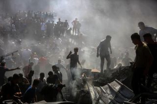 Palestinians inspect the rubble of destroyed buildings following Israeli airstrikes on the town of Khan Younis, southern Gaza Strip, Thursday, Oct. 26, 2023.
Photo Mohammed Dahman

#gaza...