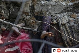 #Repost @epa_images with @use.repost
・・・
The legs of deceased mother and daughter stick out of the rubble of the destroyed Al Faseih family house following an airstrike in the Al Shatea refugee...