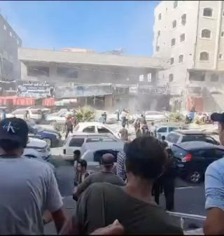 |‏Today at 12:35 pm, the IOF targeted a building near the entrance of the Al-Quds Hospital emergency ward, which resulted in the injury of 21 people from displaced families in the hospital and...