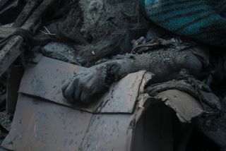 ‏Rubbles and body woman mixed together making it difficult to separate the one from another during Israel’s attacks in Gaza Strip. #gaza #epaimages #palestine 📸EPA / Mohammed Saber...