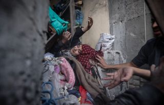 Palestinians try to rescue a woman stuck under the rubble of a destroyed building following Israeli airstrikes in Khan Younis refugee camp, southern Gaza Strip, Thursday, Dec.7, 2023.
by Mohammed...
