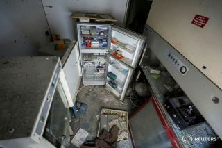 Nitrogen tanks, where embryos were stored, lie at Al Basma IVF Centre, Gaza's largest fertility clinic which was struck by an Israeli shell during the ongoing conflict between Israel and the...