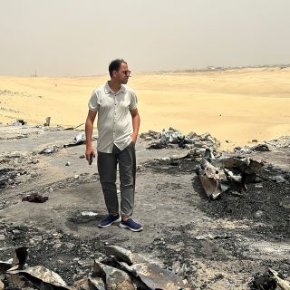 In the spot where I stand in Rafah, there were tents whose occupants perished in a fire.

Behind me, on the yellow sand, there are hundreds of tents where people have been displaced seven or eight...