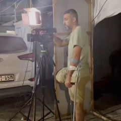 The photojournalist, Sami Shehadeh, injured in his leg as a result of an Israeli bombing, is still doing the media coverage of the Israeli war.